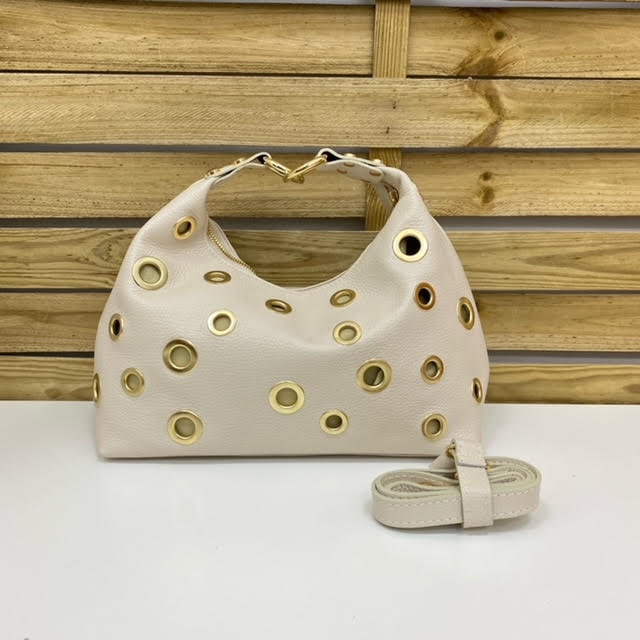 BOLSO PIEL AGUJERO TACHAS